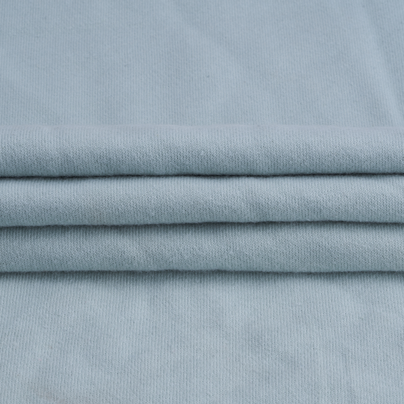 What are the key features of Hacci Fabric in the textile industry?
